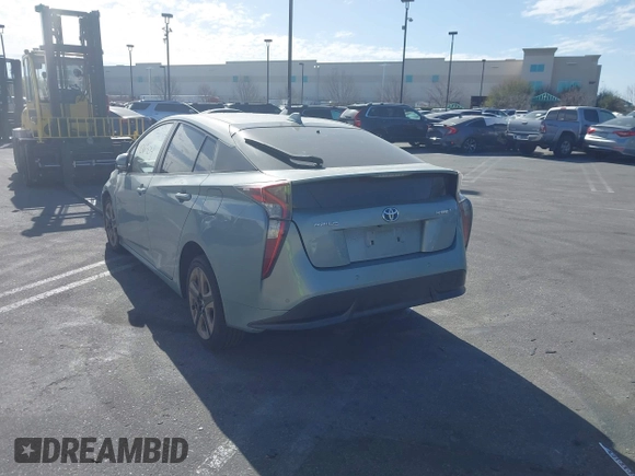 2016 Toyota Prius Four with VIN JTDKARFU8G3510996, listed as a IAAI auction lot 41406304 with 118,526 mi miles and . Bid and sale history available at DreamBid. Image 3.