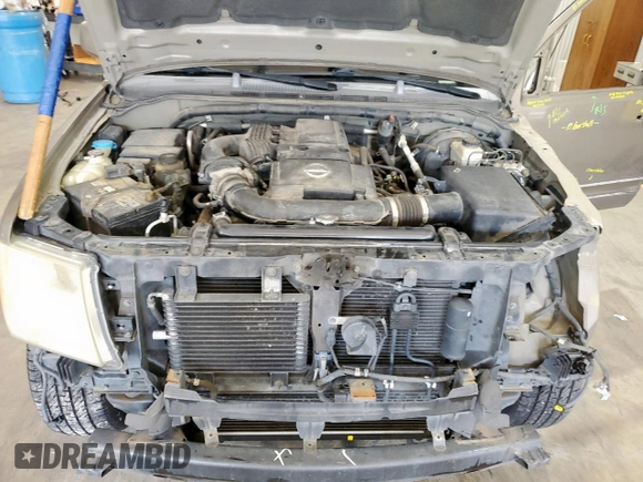 2005 Nissan Pathfinder LE with VIN 5N1AR18U45C705005, listed as a Copart auction lot 61138245 with 156,966 mi miles and Salvage title. Bid and sale history available at DreamBid. Image 12.