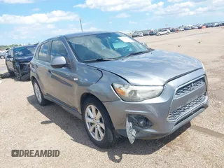2015 Mitsubishi Outlander ES z VIN 4A4AP3AUXFE026547, wystawiony jako IAAI lot #42223662 z przebiegiem 155 990 mil mil oraz . Historia ofert i sprzedaży dostępna na DreamBid. Obrazek 1.