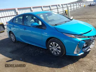 2022 Toyota Prius LE z VIN JTDKAMFP7N3198440, wystawiony jako IAAI lot #42147734 z przebiegiem 51 793 mil mil oraz . Historia ofert i sprzedaży dostępna na DreamBid. Obrazek 1.