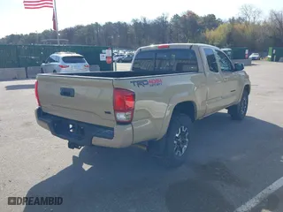 2017 Toyota Tacoma SR5 with VIN 5TFSZ5AN7HX056929, listed as a IAAI auction lot 42079525 with 82,619 mi miles. Bid and sale history available at carsss.com. Image 4.
