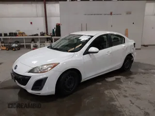 2011 Mazda 3 i Sport with VIN JM1BL1UG8B1497003, listed as a IAAI auction lot 42135286 with 129,033 mi miles and . Bid and sale history available at DreamBid. Image 2.
