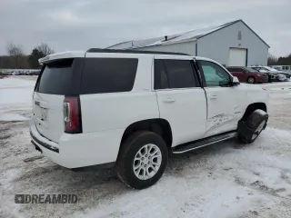 2020 GMC Yukon SLT with VIN 1GKS2BKC1LR280389, listed as a Copart auction lot 87928555 with 84,242 mi miles and Salvage Title. Bid and sale history available at carsss.com. Image 3.