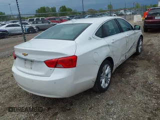 2015 Chevrolet Impala LT with VIN 1G1125S30FU140935, listed as a IAAI auction lot 42153988 with 147,828 mi miles and . Bid and sale history available at DreamBid. Image 4.
