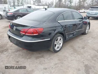 2013 Volkswagen CC Sport with VIN WVWAP7AN9DE526705, listed as a IAAI auction lot 41666264 with 145,841 mi miles. Bid and sale history available at carsss.com. Image 4.