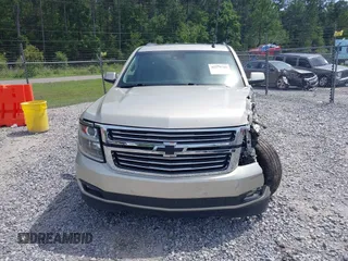 2015 Chevrolet Tahoe LT z VIN 1GNSCBKC7FR140125, wystawiony jako IAAI lot #42279760 z przebiegiem 201 335 mil mil oraz . Historia ofert i sprzedaży dostępna na DreamBid. Obrazek 12.