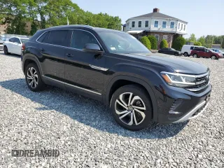 2023 Volkswagen Atlas SEL with VIN 1V2BE2CA1PC216733, listed as a Copart auction lot 59392255 with 28,011 mi miles and Salvage title. Bid and sale history available at DreamBid. Image 4.