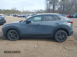 2023 Mazda CX-30 S Carbon Edition with VIN 3MVDMBCM8PM502891, listed as a IAAI auction lot 42050533 with 20,035 mi miles and . Bid and sale history available at DreamBid. Image 14.