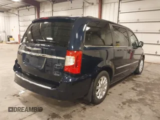 2013 Chrysler Town & Country Touring with VIN 2C4RC1BG7DR517970, listed as a IAAI auction lot 42028284 with 122,053 mi miles. Bid and sale history available at carsss.com. Image 4.