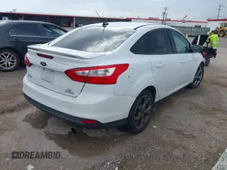 2013 Ford Focus SE with VIN 1FADP3F24DL302263, listed as a IAAI auction lot 42672666 with 207,805 mi miles and . Bid and sale history available at DreamBid. Image 4.