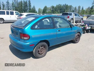 1995 Ford Aspire z VIN KNJLT05H6S6142904, wystawiony jako IAAI lot #41613061 z przebiegiem 149 534 mil mil oraz . Historia ofert i sprzedaży dostępna na DreamBid. Obrazek 4.