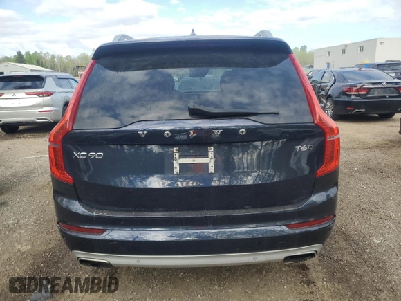 2016 Volvo XC90 T6 Momentum z VIN YV4A22PK2G1065953, wystawiony jako Copart lot #56627265 z przebiegiem 147 936 mil mil oraz Czysty tytuł • Clean title. Historia ofert i sprzedaży dostępna na DreamBid. Obrazek 6.