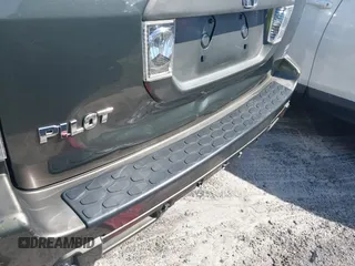 2006 Honda Pilot LX with VIN 5FNYF28156B040336, listed as a IAAI auction lot 42223190 with 158,686 mi miles and . Bid and sale history available at DreamBid. Image 12.
