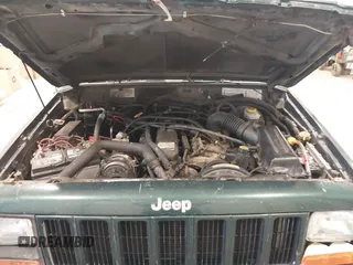 2000 Jeep Cherokee with VIN 1J4FF48SXYL116106, listed as a IAAI auction lot 42610059 with 191,513 mi miles and . Bid and sale history available at DreamBid. Image 10.