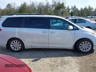 2011 Toyota Sienna XLE AAS with VIN 5TDYK3DC7BS054012, listed as a IAAI auction lot 41752182 with 123,226 mi miles and . Bid and sale history available at DreamBid. Image 13.