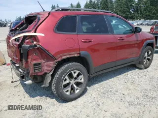 2015 Jeep Cherokee Trailhawk with VIN 1C4PJMBSXFW661218, listed as a Copart auction lot 61364895 with 139,200 mi miles and Salvage title. Bid and sale history available at DreamBid. Image 3.