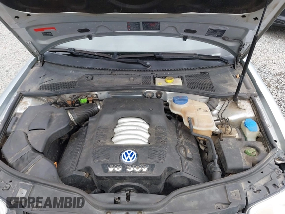2003 Volkswagen Passat GLX z VIN WVWYH63B73E070842, wystawiony jako IAAI lot #42272467 z przebiegiem 147 851 mil mil oraz . Historia ofert i sprzedaży dostępna na DreamBid. Obrazek 10.