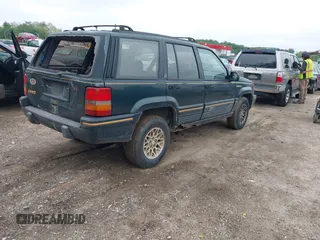 1993 Jeep Grand Cherokee Limited with VIN 1J4GZ78Y2PC540394, listed as a IAAI auction lot 42171655 with 94,417 mi miles and . Bid and sale history available at DreamBid. Image 4.