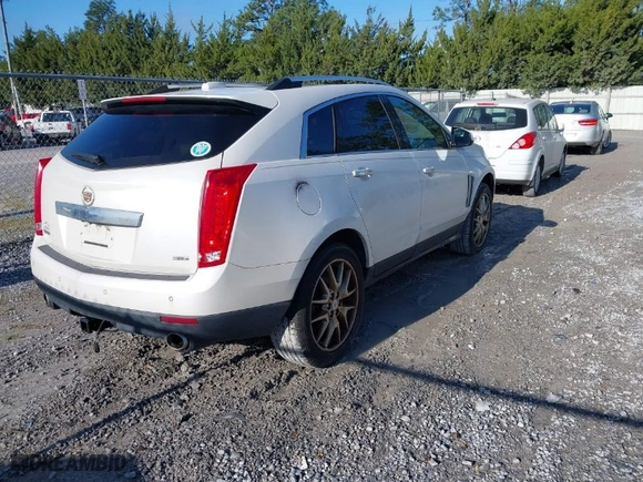 2015 Cadillac SRX Premium Collection with VIN 3GYFNDE38FS525275, listed as a IAAI auction lot 41853421 with 294,727 mi miles. Bid and sale history available at carsss.com. Image 4.