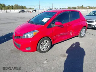 2012 Toyota Yaris L with VIN JTDKTUD33CD503112, listed as a IAAI auction lot 41093304 with 179,744 mi miles. Bid and sale history available at carsss.com. Image 2.