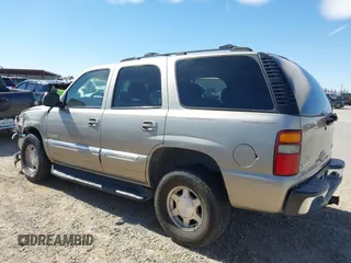 2003 GMC Yukon SLT with VIN 1GKEC13V33R298333, listed as a IAAI auction lot 41582447 with 166,047 mi miles. Bid and sale history available at carsss.com. Image 14.