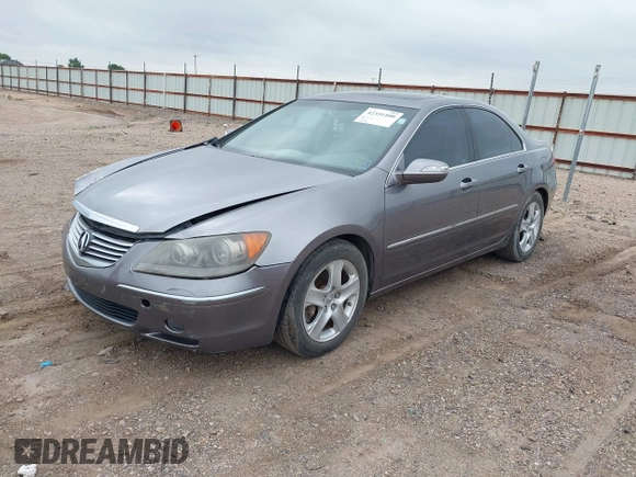 2006 Acura RL z VIN JH4KB16526C006190, wystawiony jako IAAI lot #42351400 z przebiegiem 150 749 mil mil oraz . Historia ofert i sprzedaży dostępna na DreamBid. Obrazek 2.