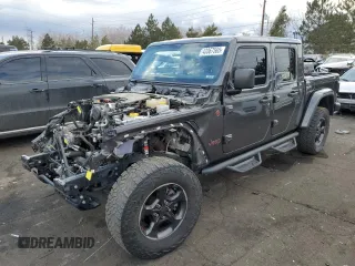 2021 Jeep Gladiator Rubicon с VIN 1C6JJTBG4ML504141, выставлен на аукционе Copart как лот 43367565 с пробегом 56 879 миль миль и Списание • Salvage title. История ставок и продаж доступна на DreamBid. Изображение 1.