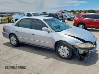 2001 Honda Accord LX z VIN 1HGCG16471A077440, wystawiony jako Copart lot #57621925 z przebiegiem 178 297 mil mil oraz Szkoda całkowita • Salvage title. Historia ofert i sprzedaży dostępna na DreamBid. Obrazek 4.