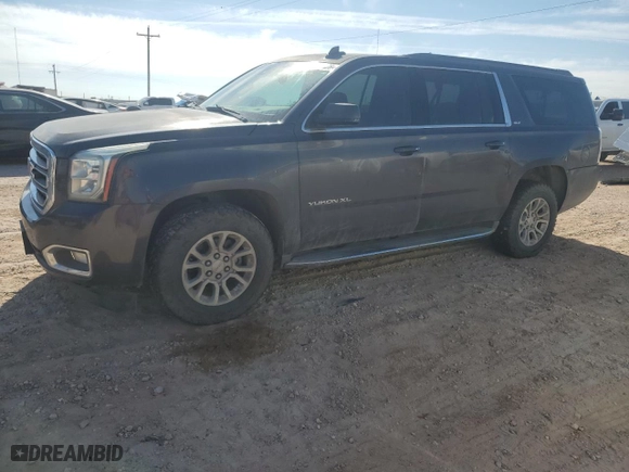 2017 GMC Yukon XL SLT with VIN 1GKS2GKC9HR323915, listed as a Copart auction lot 87661425 with 101,630 mi miles and Salvage Title. Bid and sale history available at carsss.com. Image 1.