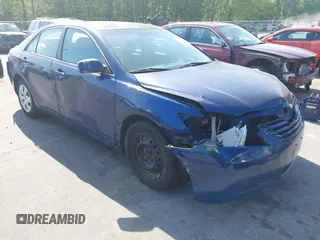 2009 Toyota Camry with VIN 4T1BE46K59U401572, listed as a IAAI auction lot 42059793 with 215,238 mi miles. Bid and sale history available at carsss.com. Image 1.