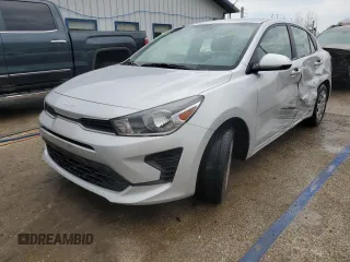 2023 Kia Rio S z VIN 3KPA24AD5PE516136, wystawiony jako Copart lot #52609525 z przebiegiem 52 379 mil mil oraz Szkody całkowita. Historia ofert i sprzedaży dostępna na DreamBid. Obrazek 1.