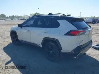 2021 Toyota RAV4 Hybrid XSE with VIN JTME6RFV4MJ008825, listed as a IAAI auction lot 42060148 with 91,129 mi miles and . Bid and sale history available at DreamBid. Image 3.