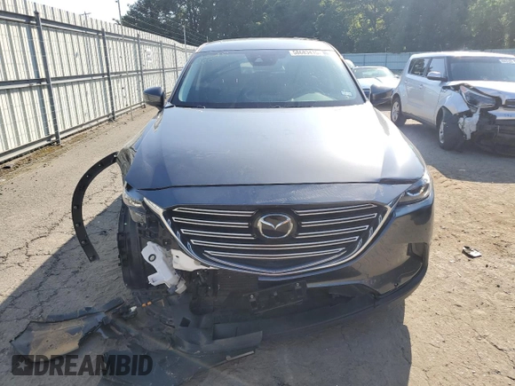 2023 Mazda CX-9 Touring с VIN JM3TCBCY6P0641298, выставлен на аукционе Copart как лот 58683415 с пробегом 16 754 миль миль и Списание • Salvage title. История ставок и продаж доступна на DreamBid. Изображение 5.