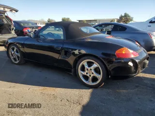 2000 Porsche Boxster z VIN WP0CA2983YU621686, wystawiony jako Copart lot #88951585 z przebiegiem 127 276 mil mil oraz Tytuł czysty. Historia ofert i sprzedaży dostępna na DreamBid. Obrazek 2.