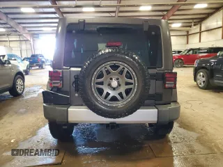 2014 Jeep Wrangler Unlimited Sahara z VIN 1C4BJWEG6EL183943, wystawiony jako Copart lot #48945325 z przebiegiem 171 711 mil mil oraz Czysty tytuł • Clean title. Historia ofert i sprzedaży dostępna na DreamBid. Obrazek 6.