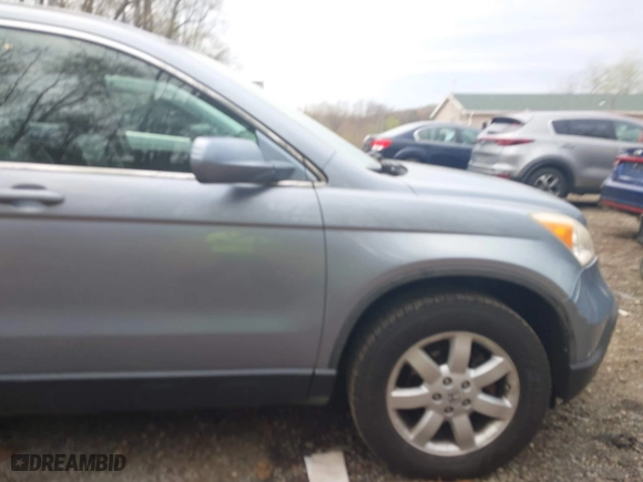 2009 Honda CR-V EX-L with VIN JHLRE48719C007622, listed as a IAAI auction lot 41999801 with 158,976 mi miles. Bid and sale history available at carsss.com. Image 19.