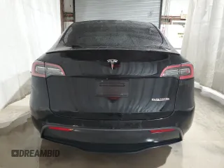 2022 Tesla Model Y Performance with VIN 7SAYGDEF3NF453267, listed as a Copart auction lot 53787615 with 82,452 mi miles and Salvage Title. Bid and sale history available at DreamBid. Image 6.