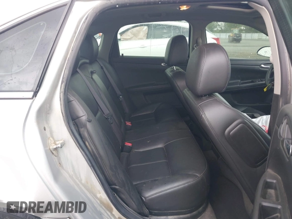 2016 Chevrolet Impala LTZ z VIN 2G1WC5E37G1106518, wystawiony jako IAAI lot #42099523 z przebiegiem 96 400 mil mil oraz . Historia ofert i sprzedaży dostępna na DreamBid. Obrazek 8.