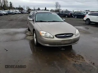 2002 Ford Taurus SE Standard z VIN 1FAFP58232G206714, wystawiony jako Copart lot #45911595 z przebiegiem 150 192 mil mil oraz Szkoda całkowita • Salvage title. Historia ofert i sprzedaży dostępna na DreamBid. Obrazek 11.