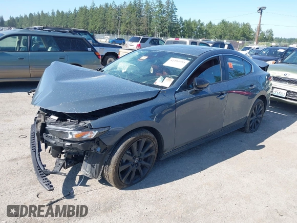 2023 Mazda 3 S Carbon Edition with VIN 3MZBPACM5PM376545, listed as a IAAI auction lot 42404054 with Not provided miles and . Bid and sale history available at DreamBid. Image 2.