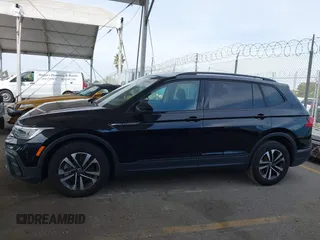 2023 Volkswagen Tiguan S with VIN 3VVRB7AX7PM109974, listed as a IAAI auction lot 41686163 with 42,284 mi miles and . Bid and sale history available at DreamBid. Image 14.