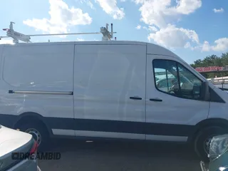 2023 Ford Transit Cargo with VIN 1FTBR1C87PKA63830, listed as a IAAI auction lot 40797669 with 69,162 mi miles and . Bid and sale history available at DreamBid. Image 14.