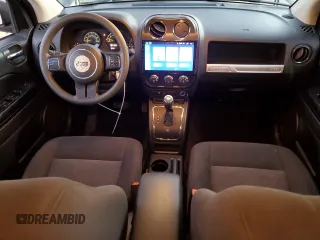 2016 Jeep Compass Sport with VIN 1C4NJCBB3GD574632, listed as a Copart auction lot 88016225 with 93,138 mi miles and Salvage title. Bid and sale history available at DreamBid. Image 8.