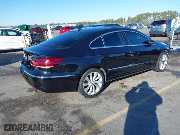 2013 Volkswagen CC VR6 Lux with VIN WVWHU7AN8DE509059, listed as a IAAI auction lot 41402695 with 123,518 mi miles. Bid and sale history available at carsss.com. Image 4.