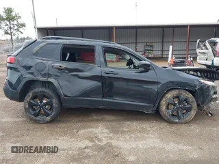 2016 Jeep Cherokee Latitude with VIN 1C4PJLCSXGW229710, listed as a IAAI auction lot 41094091 with 131,501 mi miles. Bid and sale history available at carsss.com. Image 17.