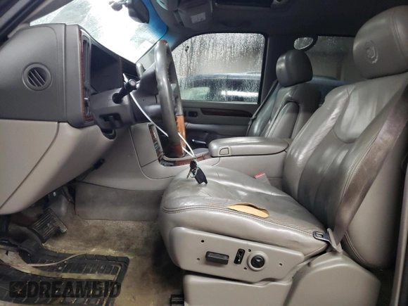 2003 Cadillac Escalade EXT z VIN 3GYEK63N33G118001, wystawiony jako Copart lot #86897574 z przebiegiem 223 953 mil mil oraz Szkoda całkowita • Salvage title. Historia ofert i sprzedaży dostępna na DreamBid. Obrazek 7.