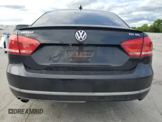2014 Volkswagen Passat SEL Premium z VIN 1VWCN7A34EC066375, wystawiony jako Copart lot #54016005 z przebiegiem 170 305 mil mil oraz Szkoda całkowita • Salvage title. Historia ofert i sprzedaży dostępna na DreamBid. Obrazek 6.