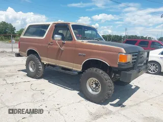 1987 Ford Bronco Custom with VIN 1FMEU15HXHLA38260, listed as a IAAI auction lot 42612768 with 55,696 mi miles and . Bid and sale history available at DreamBid. Image 1.