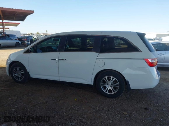2012 Honda Odyssey EX-L with VIN 5FNRL5H67CB051764, listed as a IAAI auction lot 42493181 with 167,189 mi miles and . Bid and sale history available at DreamBid. Image 14.