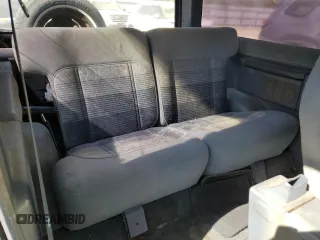 1990 Ford Bronco z VIN 1FMCU12T2LUA31399, wystawiony jako Copart lot #77099614 z przebiegiem 85 663 mil mil oraz Szkoda całkowita • Salvage title. Historia ofert i sprzedaży dostępna na DreamBid. Obrazek 10.